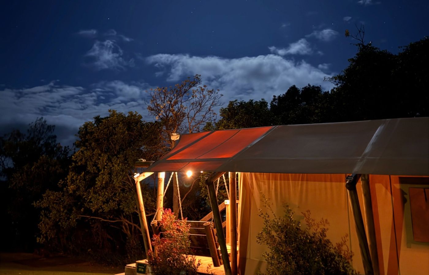 Canvas camping stay glowing at night in Bonny Hills