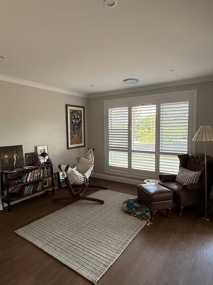Reading room with leather chair and books