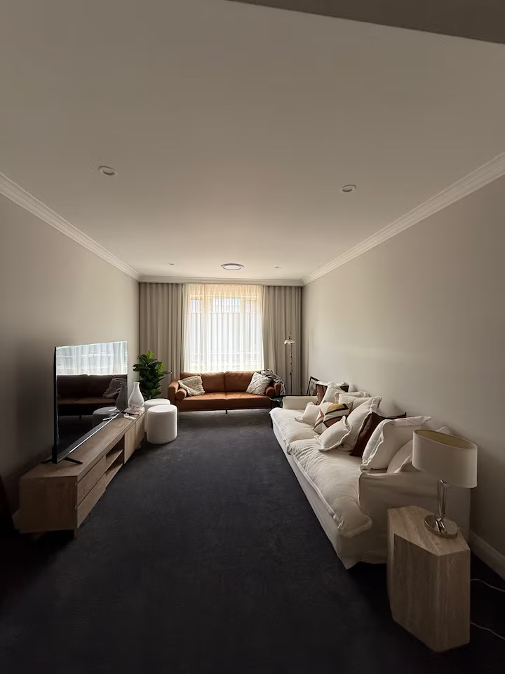 Second living room with sofa and television